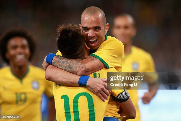 Diego Tardelli of Brazil celebrates after scoring the second goal with Neymar of Brazil during Super Clasico de las Americas between Argentina and...