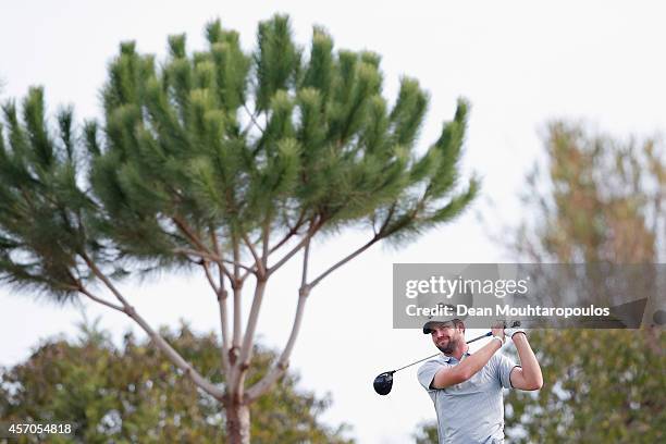 Scott Jamieson of Scotland hits his tee shot on the 17th hole during Day 3 of the Portugal Masters held at the Oceanico Victoria Golf Course on...