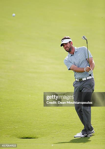 Scott Jamieson of Scotland hits his third shot on the 17th hole during Day 3 of the Portugal Masters held at the Oceanico Victoria Golf Course on...