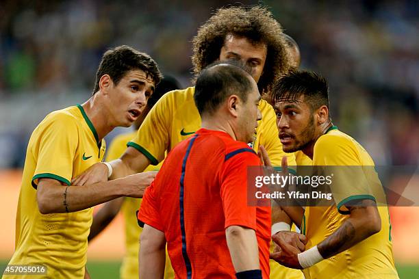 Neymar of Brazil argues with referee Fan Qi during a match between Argentina and Brazil as part of 2014 Superclasico de las Americas at Bird Nest...