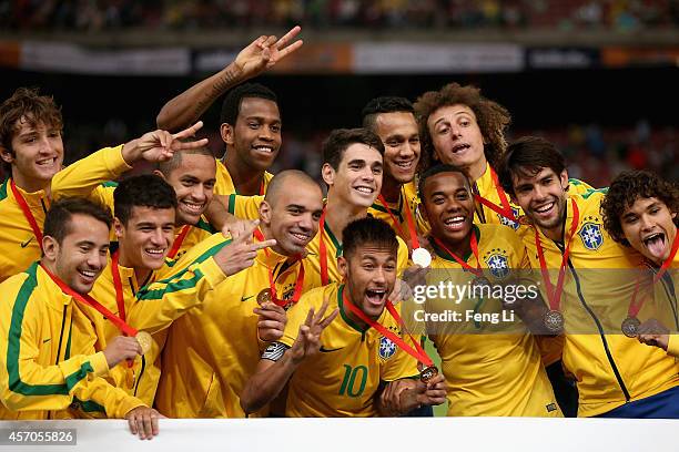 Team of Brazil celebrates winning Super Clasico de las Americas between Argentina and Brazil at Beijing National Stadium on October 11, 2014 in...