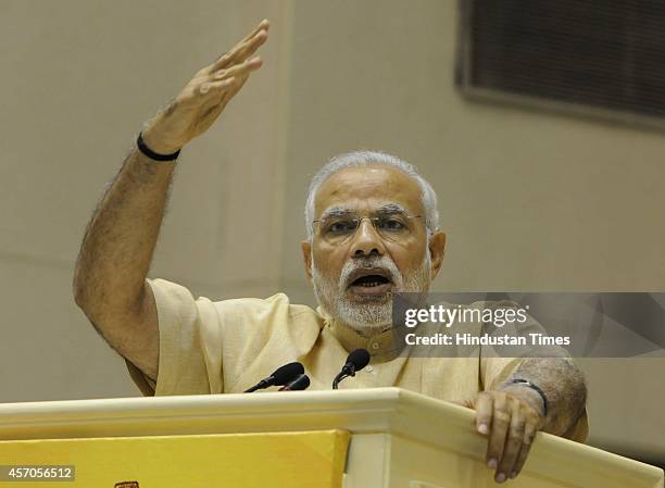 Prime Minister Narendra Modi addresses during the launch of Saansad Adarsh Gram Yojana , on October 11, 2014 in New Delhi, India. Modi launched an...