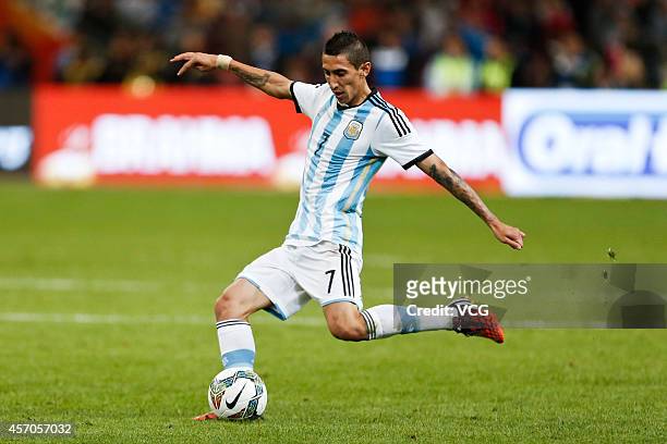 Angel Di Maria of Argentina kicks the ball during a match between Argentina and Brazil as part of 2014 Super Clasico at Beijing National Stadium on...