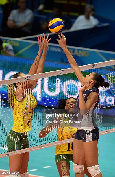Thaisa Menezes of Brazil compete for the ball with Alisha Glass of USA during the FIVB Women's World Championship semi-final match between USA and...