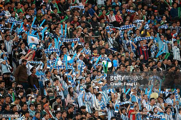 Fans of Argentina react during Super Clasico de las Americas between Argentina and Brazil at Beijing National Stadium on October 11, 2014 in Beijing,...