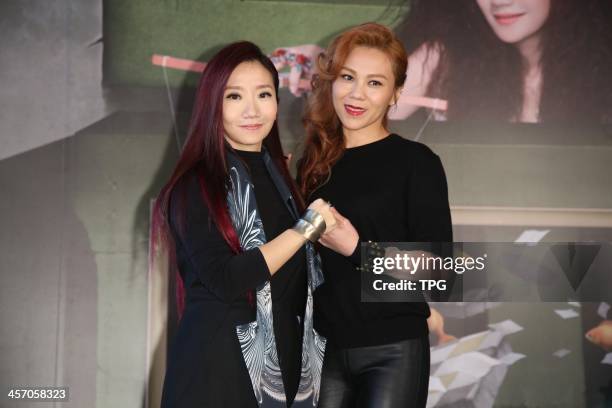 Momoco Tao promotes her new album on Sunday December 15,2013 in Taipei,China.Tanya Chua presents to support.