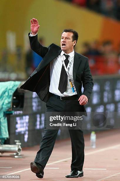 Dunga, head coach of Brazil reacts during Super Clasico de las Americas between Argentina and Brazil at Beijing National Stadium on October 11, 2014...