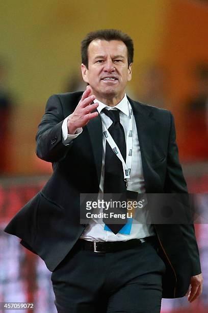 Dunga, head coach of Brazil reacts during Super Clasico de las Americas between Argentina and Brazil at Beijing National Stadium on October 11, 2014...