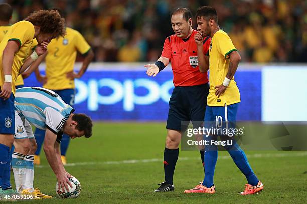 Neymar of Brazil and Lionel Messi of Argentina react during Super Clasico de las Americas between Argentina and Brazil at Beijing National Stadium on...