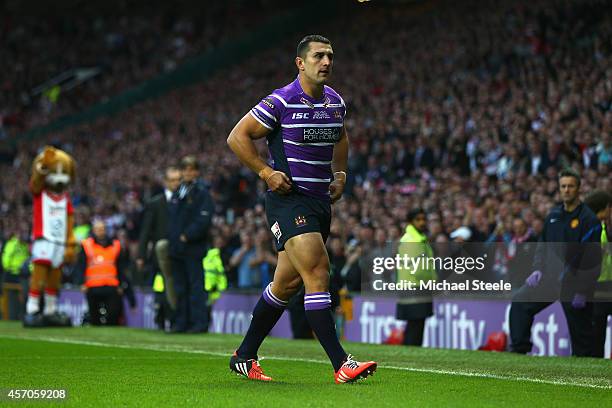 Ben Flower of Wigan walks from the pitch after receiving a red card during the First Utility Super League Grand Final match between St Helens and...