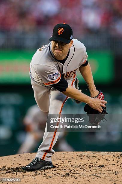 Tim Hudson of the San Francisco Giants pitches against the Washington Nationals during Game Two of the National League Division Series at Nationals...