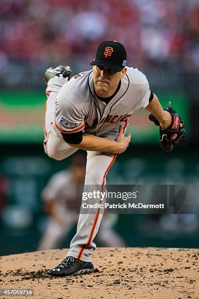 Tim Hudson of the San Francisco Giants pitches against the Washington Nationals during Game Two of the National League Division Series at Nationals...