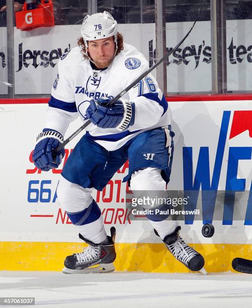 Pierre-Cedric Labrie of the Tampa Bay Lightning skates during an NHL hockey game against the New Jersey Devils at Prudential Center on December 14,...