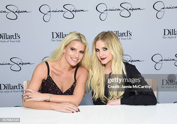 Jessica Simpson wearing Jessica Simpson Collection and Ashlee Simpson Ross wearing Jessica Simpson Collection attend an in-store event at Dillard's...