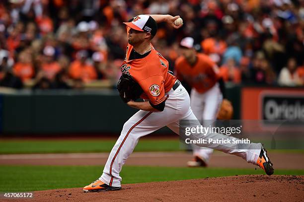 Bud Norris of the Baltimore Orioles throws a pitch to Alcides Escobar of the Kansas City Royals in the first inning during Game Two of the American...