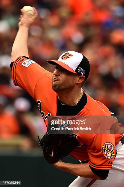 Bud Norris of the Baltimore Orioles throws a pitch to Alcides Escobar of the Kansas City Royals in the first inning during Game Two of the American...