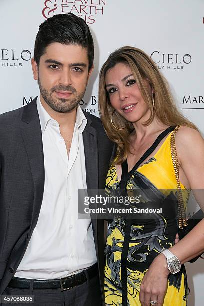 Actor Beejan Land and Ellie Tavakoli attend the Heaven and Earth Oasis Charity fundraiser at Il Cielo on October 11, 2014 in Beverly Hills,...