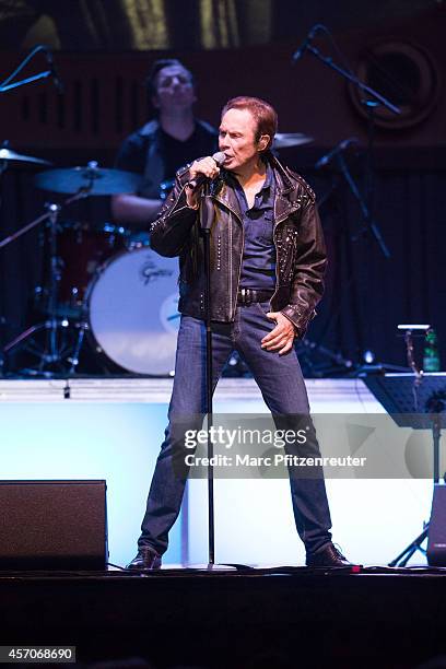 German singer and actor Peter Kraus performs during his 'Das Beste kommt zum Schluss' farewell tour, at the Lanxess Arena on October 11, 2014 in...