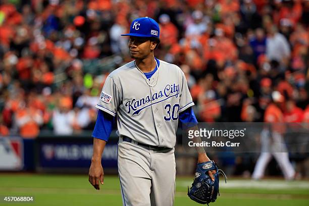 Yordano Ventura of the Kansas City Royals walks back to the dugout at the end of the third inning against the Baltimore Orioles during Game Two of...