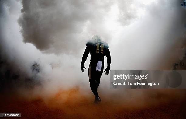 Taylor Young of the Baylor Bears walks on the field before taking on the TCU Horned Frogs at McLane Stadium on October 11, 2014 in Waco, Texas.