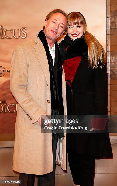 Wilfried Hochholdinger and Alexandra Vogel attend 'The Physician' German Premiere on December 16, 2013 in Berlin, Germany.