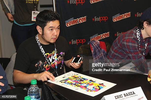 Eric Bauza attends the Cartoon Network Super Panel: CN Anything autograph signing at New York Comic Con 2014 at Jacob Javitz Center on October 11,...