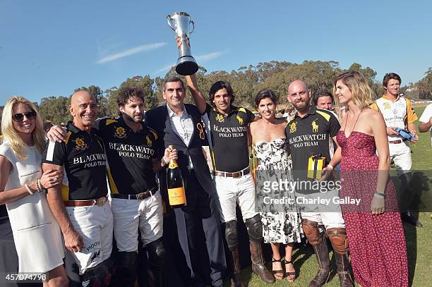 Polo players Tom Barrack, Rico Mansur, President of Veuve Clicquot Jean-Marc Gallot, polo player Nacho Figueras, President of Veuve Clicquot USA...
