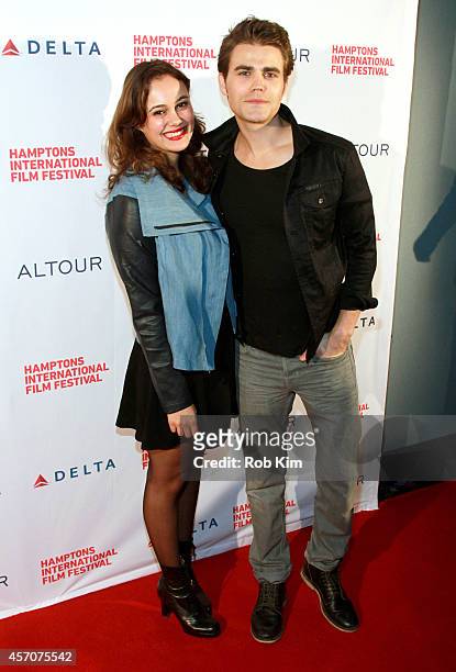 Actors Dina Shihabi and Paul Wesley attend the Amira & Sam premiere during the 2014 Hamptons International Film Festival on October 11, 2014 in East...