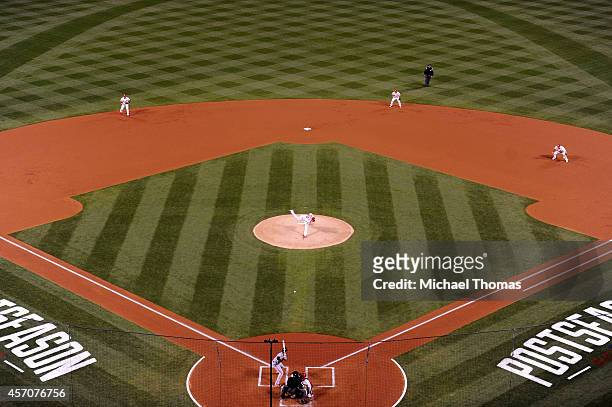 Adam Wainwright of the St. Louis Cardinals pitches against the San Francisco Giants during Game One of the National League Championship Series at...