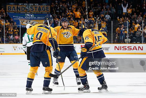 Shea Weber celebrates his goal with Craig Smith and Filip Forsberg of the Nashville Predators against the Dallas Stars at Bridgestone Arena on...