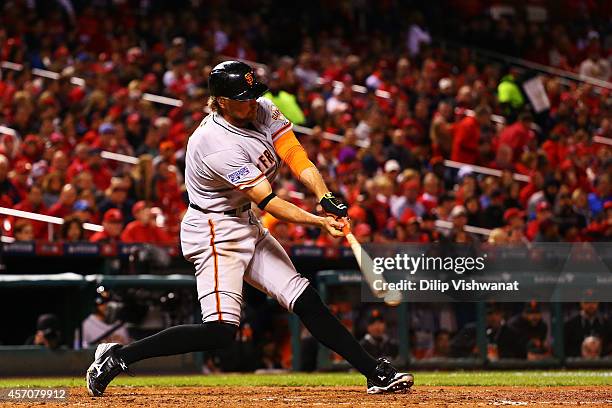 Hunter Pence of the San Francisco Giants grounds into a fielder's choice in the fifth inning against the St. Louis Cardinals during Game One of the...