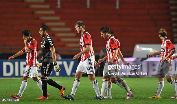 Players of Estudiantes leaves the field after a match between Estudiantes and Racing Club as part of Torneo de Transicion 2014 at Ciudad de la Plata...