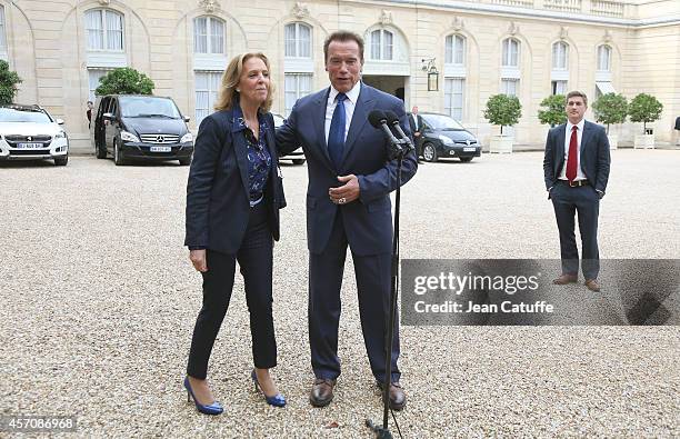 French President Francois Hollande receives Arnold Schwarzenegger and Michele Sabban to talk about climate change at Elysee Palace on October 10,...