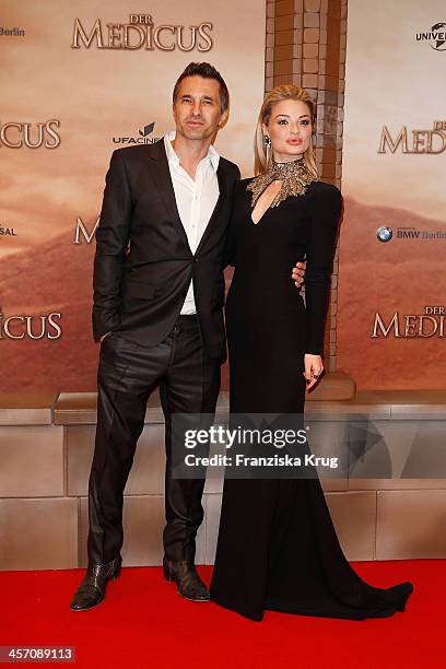 Olivier Martinez and Emma Rigby attend 'The Physician' German Premiere on December 16, 2013 in Berlin, Germany.