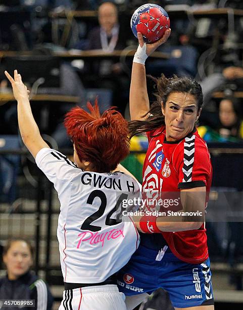 Sanja Damnjanovic of Serbia in action against Han Na Gwon of South Korea during the 2013 World Women's Handball Championship 2013 match between South...