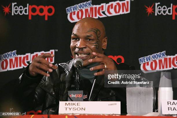 Mike Tyson speaks at The Adult Swim Mike Tyson Mysteries panel during Adult Swim At New York Comic Con 2014 at Jacob Javitz Center on October 11,...