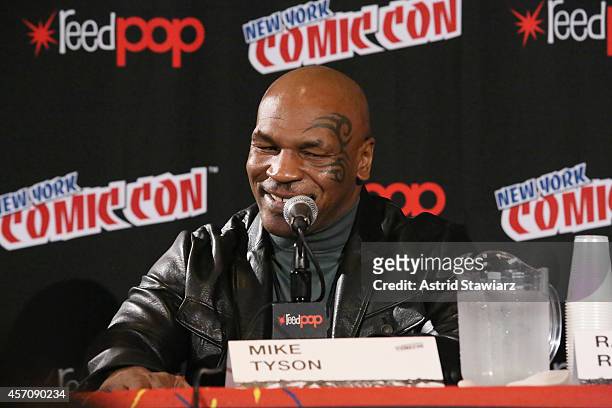 Mike Tyson speaks at The Adult Swim Mike Tyson Mysteries panel during Adult Swim At New York Comic Con 2014 at Jacob Javitz Center on October 11,...