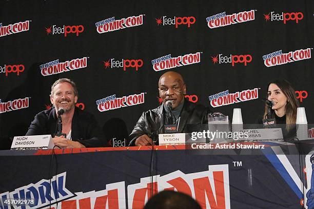 Hugh Davidson, Mike Tyson and Racel Ramrasspeak at The Adult Swim Mike Tyson Mysteries panel during Adult Swim At New York Comic Con 2014 Jacob...