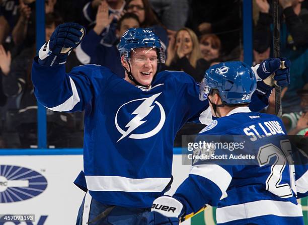 Ondrej Palat and Martin St. Louis of the Tampa Bay Lightning celebrates a goal against the Ottawa Senators at the Tampa Bay Times Forum on December...