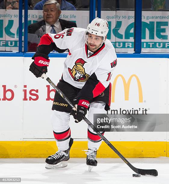 Clarke MacArthur of the Ottawa Senators carries the puck against the Tampa Bay Lightning at the Tampa Bay Times Forum on December 5, 2013 in Tampa,...
