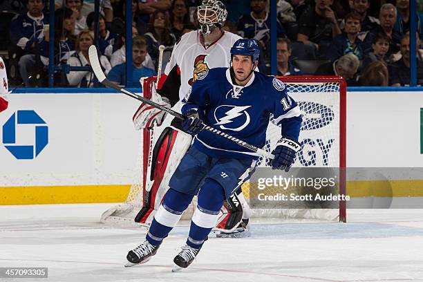 Crombeen of the Tampa Bay Lightning skates against the Ottawa Senators at the Tampa Bay Times Forum on December 5, 2013 in Tampa, Florida.