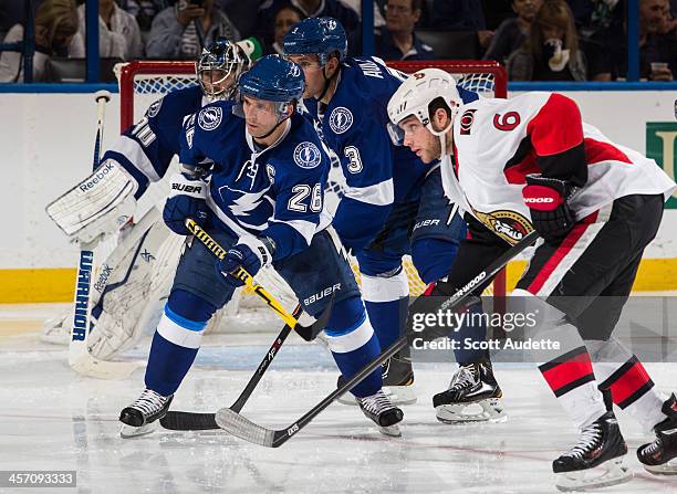 Martin St. Louis of the Tampa Bay Lightning during a faceoff against Bobby Ryan of the Ottawa Senators during the first period at the Tampa Bay Times...