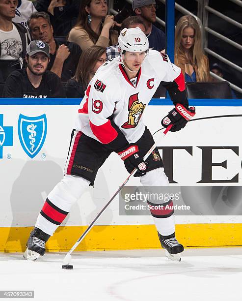 Jason Spezza of the Ottawa Senators carries the puck against the Tampa Bay Lightning at the Tampa Bay Times Forum on December 5, 2013 in Tampa,...