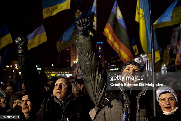 Anti-government protesters react to a speech from opposition leader Vitali Klitschko in Independance Square, on December 16, 2013. Thousands of...