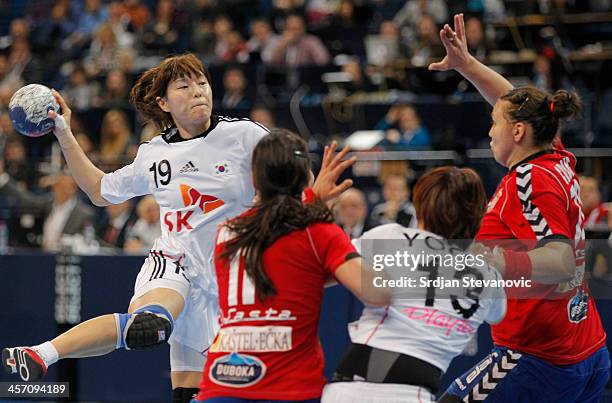 Jihae Jung of South Korea in action against Sanja Damnjanovic of Serbia during the 2013 World Women's Handball Championship 2013 match between South...