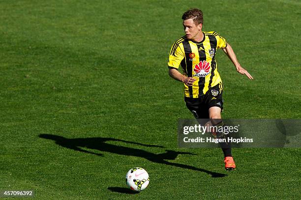 Michael McGlinchey of the Phoenix runs the ball during the round one A-League match between Wellington Phoenix and Perth Glory at Westpac Stadium on...