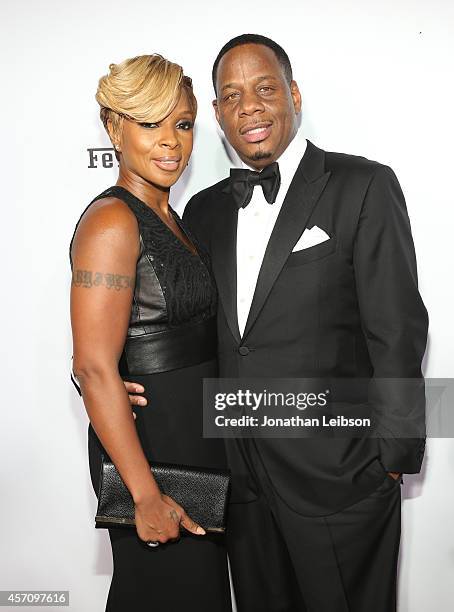 Singer/songwriter Mary J. Blige and Kendu Isaacs attend Ferrari Celebrates 60 Years In America on October 11, 2014 in Los Angeles, California.