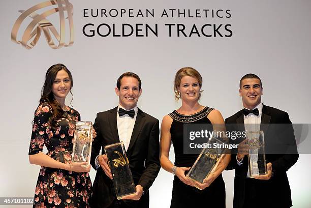 Maria Kuchina of Russia poses with the Woman's Rising Star award, Renaud Lavillenie of France poses with the Mens's European Athlete of the year...