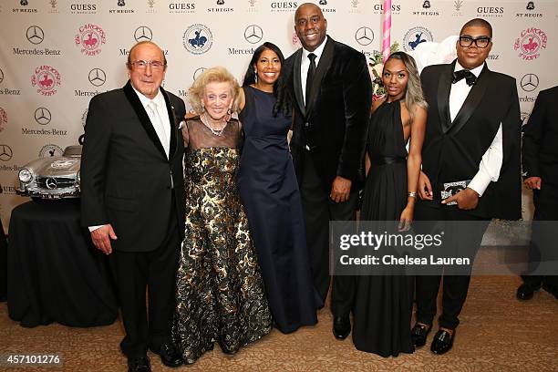 Sony Music Entertainment Chief Creative Officer Clive Davis, Carousel of Hope Chairman Barbara Davis, Cookie Johnson, honoree Earvin 'Magic' Johnson,...