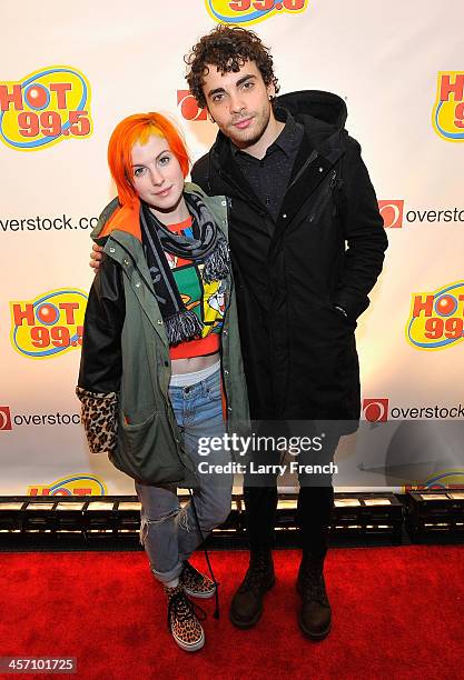 Haley Williams and Taylor York of Paramore attend Hot 99.5s Jingle Ball 2013, presented by Overstock.com, at Verizon Center on December 16, 2013 in...